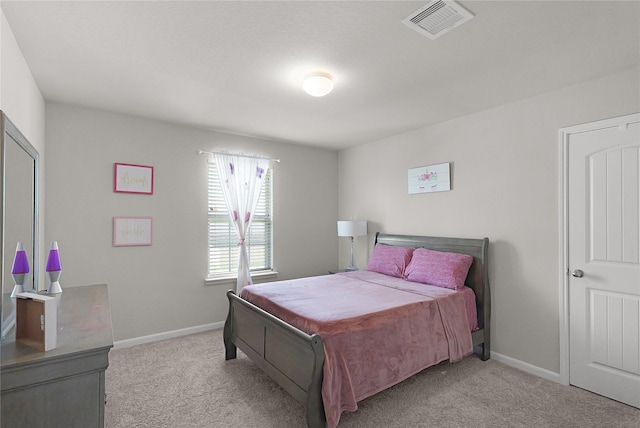 18519 Orono Ridge Trl, Richmond, TX 77407 - bedroom with light carpet and baseboards