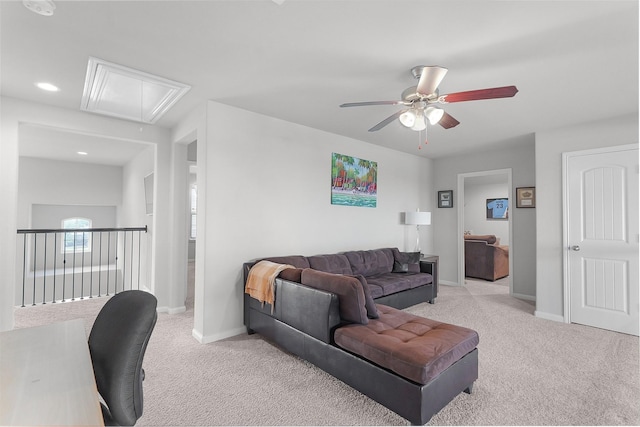 18519 Orono Ridge Trl, Richmond, TX 77407 - living room with attic access, light carpet, and ceiling fan