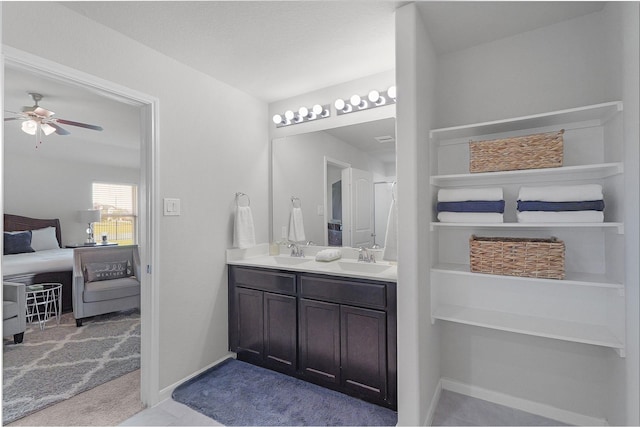 18519 Orono Ridge Trl, Richmond, TX 77407 - bathroom with a ceiling fan and double vanity