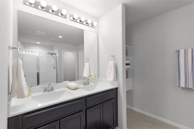 18519 Orono Ridge Trl, Richmond, TX 77407 - full bathroom with double vanity, a stall shower, tile patterned flooring, and recessed lighting