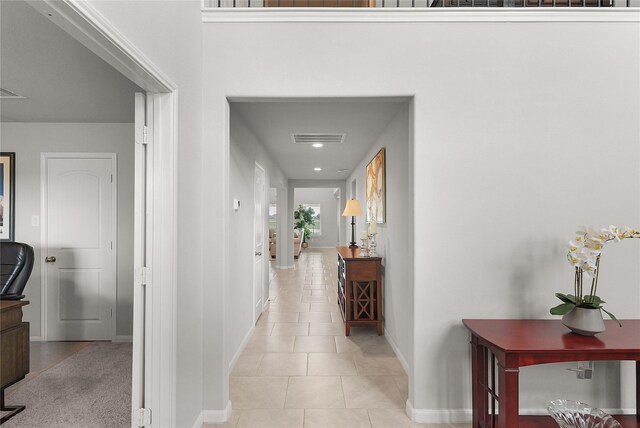 18519 Orono Ridge Trl, Richmond, TX 77407 - hallway featuring baseboards and light tile patterned floors
