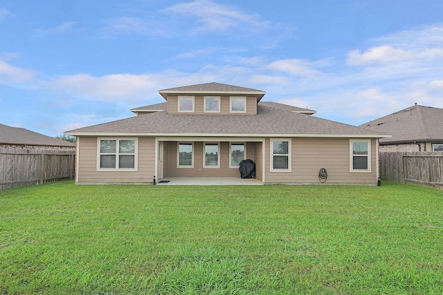 18519 Orono Ridge Trl, Richmond, TX 77407 - back of house featuring a patio, a fenced backyard, and a shingled roof