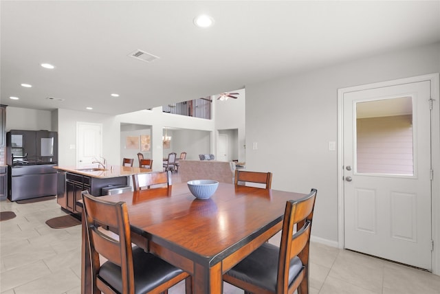 18519 Orono Ridge Trl, Richmond, TX 77407 - dining room featuring ceiling fan, light tile patterned flooring, and recessed lighting
