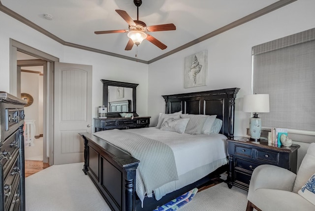4216 Karankawa Way, Jamaica Beach, TX 77554 - bedroom featuring crown molding, light wood-type flooring, and a ceiling fan