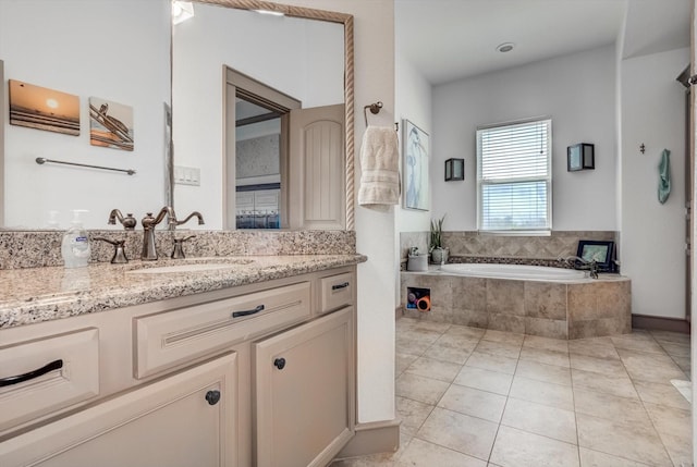 4216 Karankawa Way, Jamaica Beach, TX 77554 - bathroom featuring a bath, vanity, and tile patterned flooring