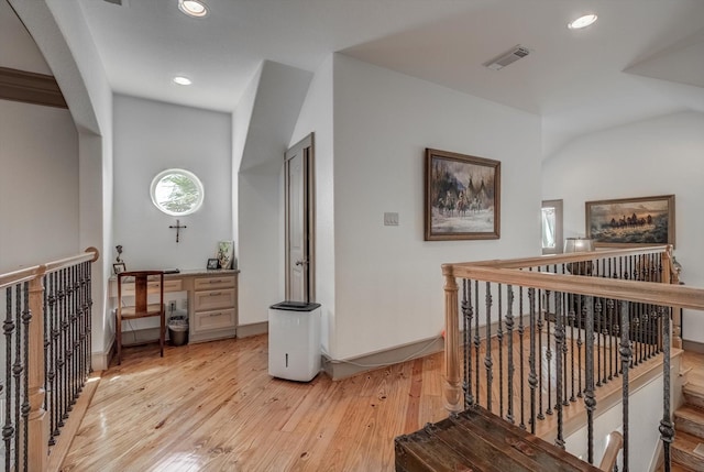 4216 Karankawa Way, Jamaica Beach, TX 77554 - hallway featuring an upstairs landing, light wood finished floors, and recessed lighting