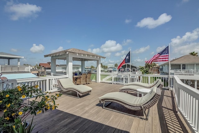 4216 Karankawa Way, Jamaica Beach, TX 77554 - wooden terrace with a gazebo