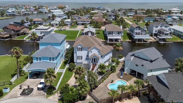 4216 Karankawa Way, Jamaica Beach, TX 77554 - aerial view of residential area with a large body of water