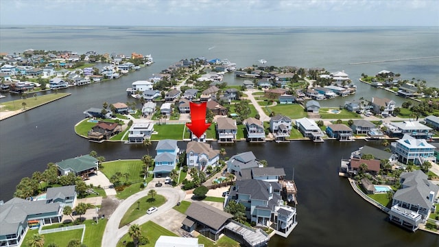 4216 Karankawa Way, Jamaica Beach, TX 77554 - aerial perspective of suburban area with a large body of water