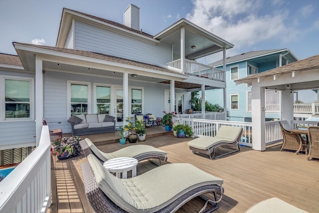 4216 Karankawa Way, Jamaica Beach, TX 77554 - wooden terrace with an outdoor hangout area