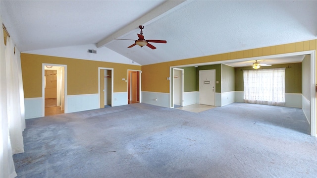 826 Kentucky St, Deer Park, TX 77536 - unfurnished living room with ceiling fan, wainscoting, and carpet flooring