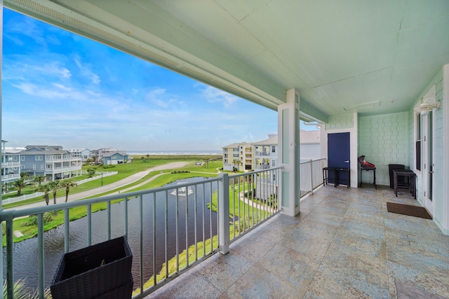 4121 Pointe W Dr Unit 301, Galveston, TX 77554 - balcony with a water view