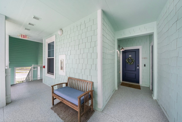 4121 Pointe W Dr Unit 301, Galveston, TX 77554 - property entrance featuring a porch