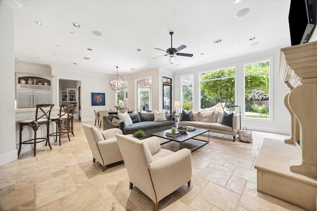 2 Hedwig Shadows Dr, Houston, TX 77024 - living room with stone tile floors, a ceiling fan, crown molding, recessed lighting, and a chandelier