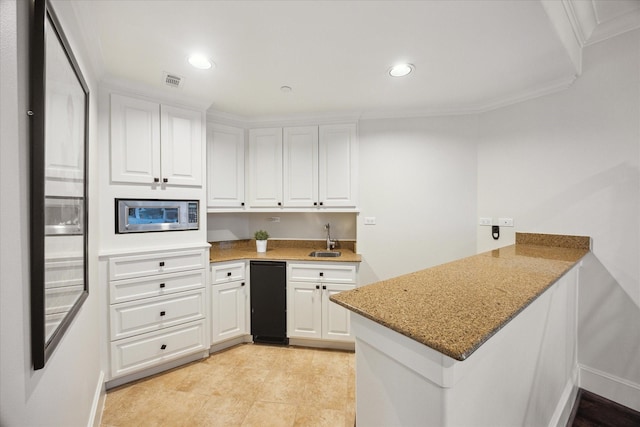 2 Hedwig Shadows Dr, Houston, TX 77024 - kitchen featuring stainless steel microwave, a peninsula, crown molding, white cabinets, and recessed lighting