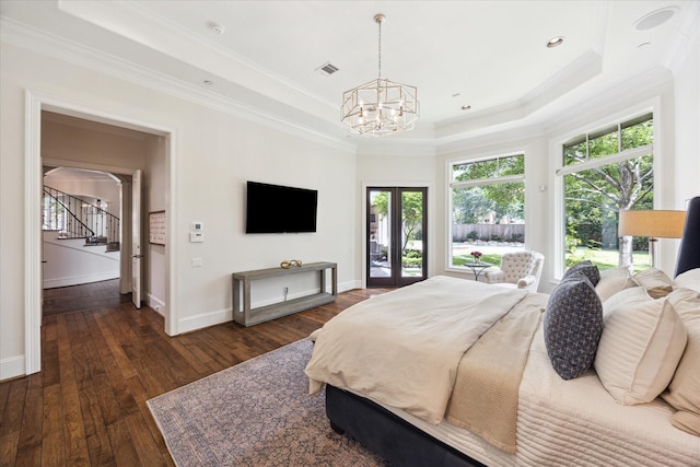 2 Hedwig Shadows Dr, Houston, TX 77024 - bedroom with a tray ceiling, crown molding, a chandelier, dark wood finished floors, and access to exterior