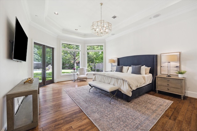 2 Hedwig Shadows Dr, Houston, TX 77024 - bedroom featuring a chandelier, crown molding, a raised ceiling, and wood-type flooring