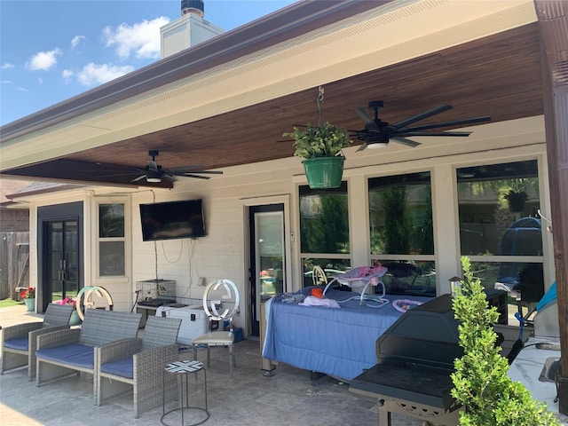 8927 Alcina Dr, Tomball, TX 77375 - view of patio featuring a ceiling fan