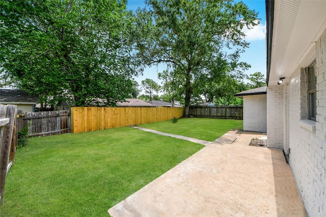 10415 Towne Oak Ln, Sugar Land, TX 77498 - fenced backyard with a patio area