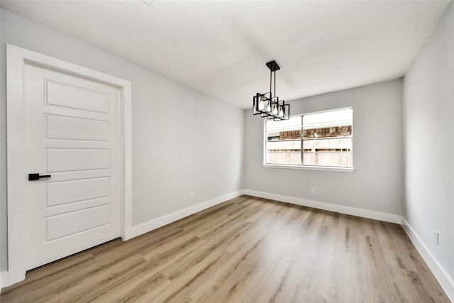 10415 Towne Oak Ln, Sugar Land, TX 77498 - empty room featuring wood finished floors and baseboards