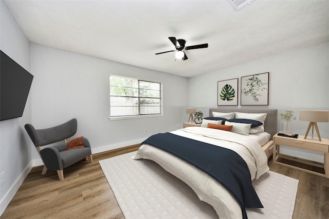 10415 Towne Oak Ln, Sugar Land, TX 77498 - bedroom featuring light wood-style floors and a ceiling fan