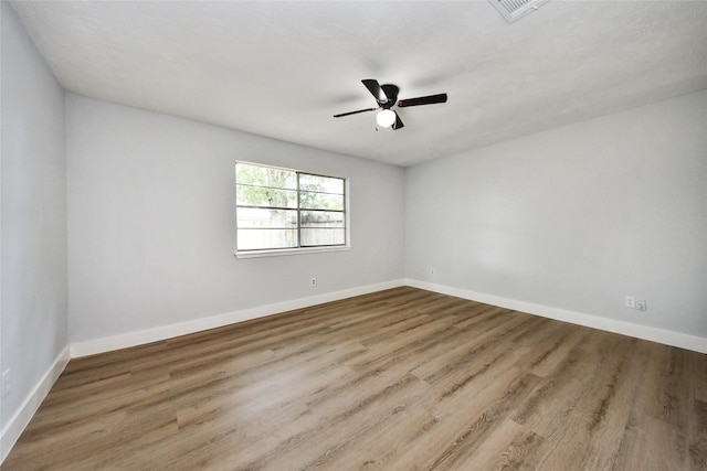 10415 Towne Oak Ln, Sugar Land, TX 77498 - unfurnished room with wood finished floors and a ceiling fan