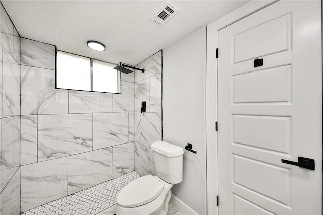 10415 Towne Oak Ln, Sugar Land, TX 77498 - full bathroom with toilet and a tile shower