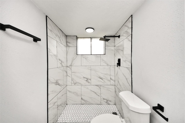 10415 Towne Oak Ln, Sugar Land, TX 77498 - bathroom with toilet and a tile shower