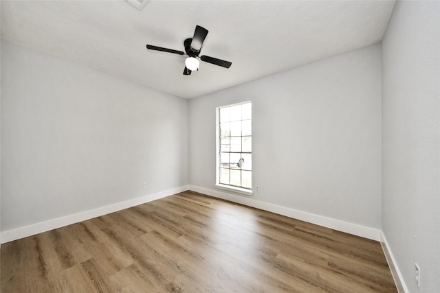10415 Towne Oak Ln, Sugar Land, TX 77498 - unfurnished room featuring wood finished floors and a ceiling fan