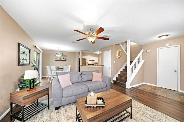 2211 S Kirkwood Rd Unit 23, Houston, TX 77077 - living room with stairway and a ceiling fan