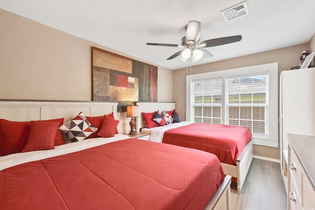 315 E Adoue St, Baytown, TX 77520 - bedroom featuring wood finished floors and ceiling fan