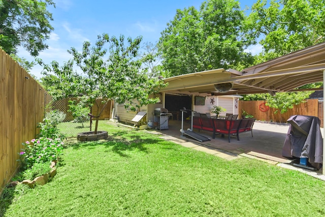 315 E Adoue St, Baytown, TX 77520 - fenced backyard with a patio
