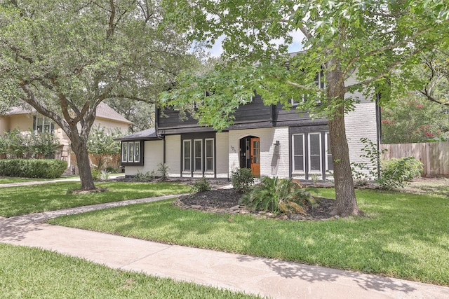 1711 Mossy Stone Dr, Houston, TX 77077 - obstructed view of property featuring brick siding