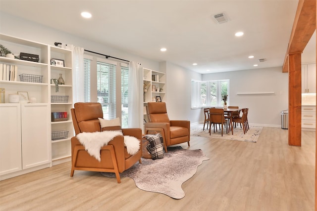 1711 Mossy Stone Dr, Houston, TX 77077 - sitting room featuring light wood-type flooring and recessed lighting