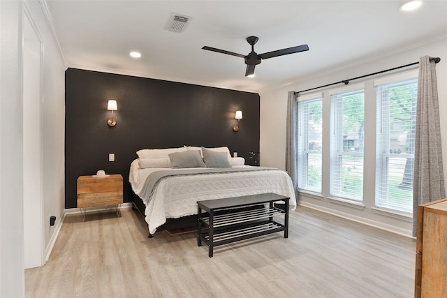 1711 Mossy Stone Dr, Houston, TX 77077 - bedroom with light wood-style flooring, ornamental molding, recessed lighting, and ceiling fan
