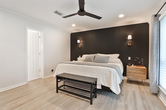 1711 Mossy Stone Dr, Houston, TX 77077 - bedroom with light wood finished floors, crown molding, recessed lighting, and ceiling fan
