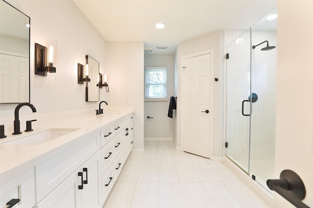 1711 Mossy Stone Dr, Houston, TX 77077 - full bathroom featuring double vanity, a stall shower, recessed lighting, and tile patterned flooring