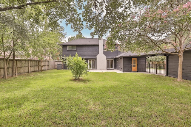 1711 Mossy Stone Dr, Houston, TX 77077 - rear view of property featuring a fenced backyard and a patio area