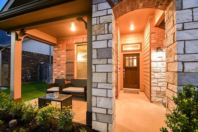 18534 Ariat Dr, Cypress, TX 77429 - entrance to property with brick siding, covered porch, and stone siding