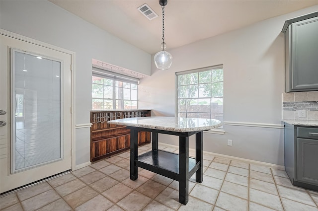 3402 Santa Catalina Ct, Katy, TX 77450 - unfurnished dining area with baseboards