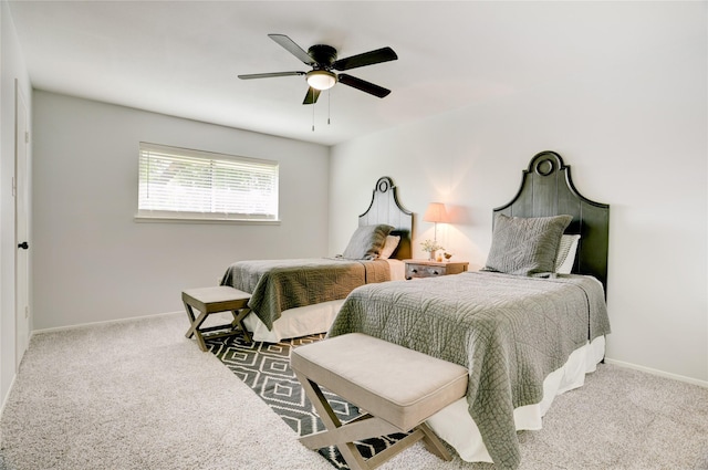 2510 Trailside Ct, Sugar Land, TX 77479 - carpeted bedroom with baseboards and a ceiling fan