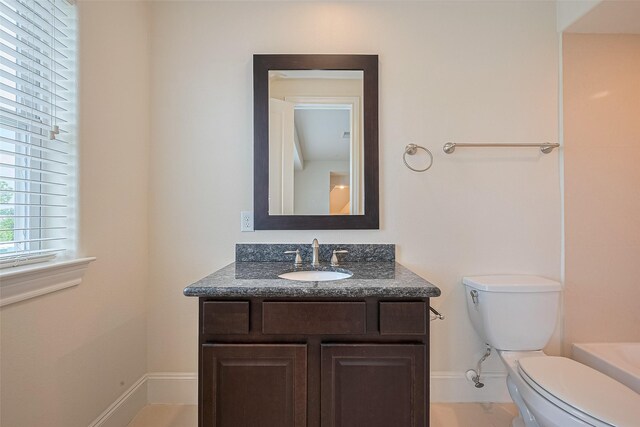 1035 E 28th St, Houston, TX 77009 - bathroom featuring vanity and baseboards