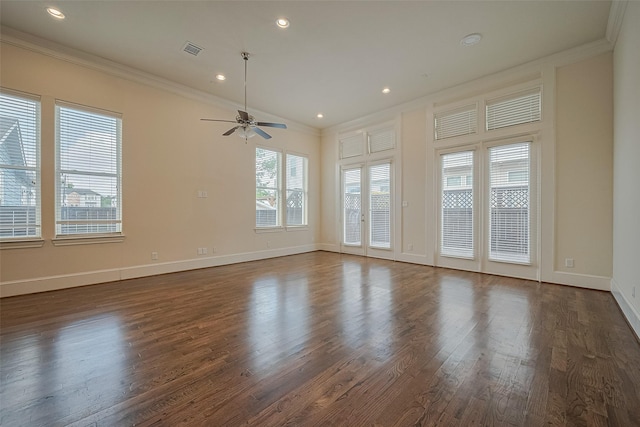 1035 E 28th St, Houston, TX 77009 - spare room with ornamental molding, dark wood finished floors, ceiling fan, and recessed lighting