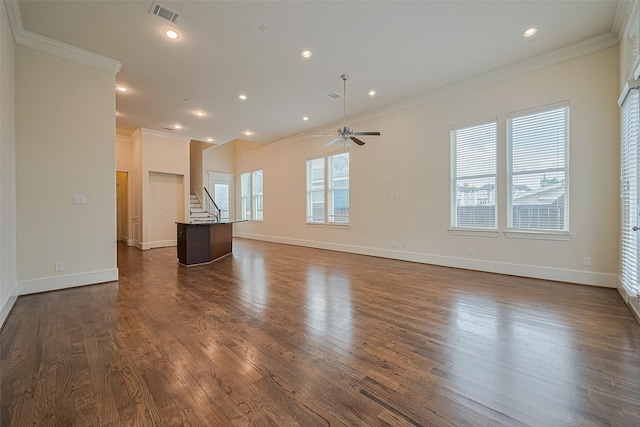 1035 E 28th St, Houston, TX 77009 - unfurnished living room featuring ornamental molding, a ceiling fan, stairway, dark wood-style floors, and recessed lighting