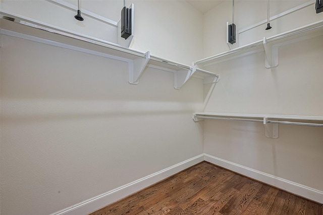 1035 E 28th St, Houston, TX 77009 - spacious closet with dark wood-style flooring