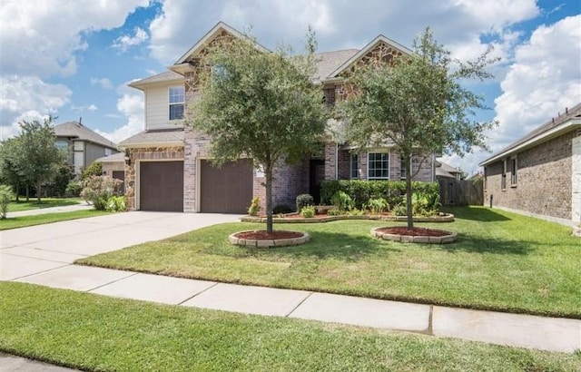 8615 Debbie Terrace Dr, Cypress, TX 77433 - view of front of home featuring an attached garage, driveway, and a front yard