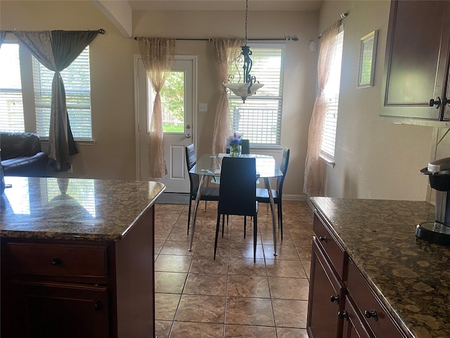 8615 Debbie Terrace Dr, Cypress, TX 77433 - dining space with light tile patterned flooring and baseboards