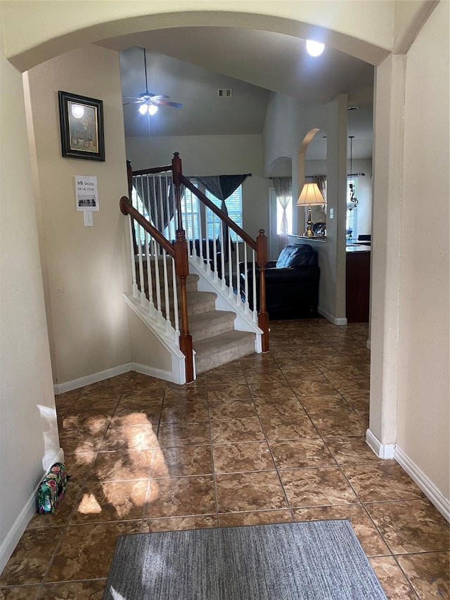 8615 Debbie Terrace Dr, Cypress, TX 77433 - foyer entrance featuring arched walkways, a ceiling fan, and vaulted ceiling