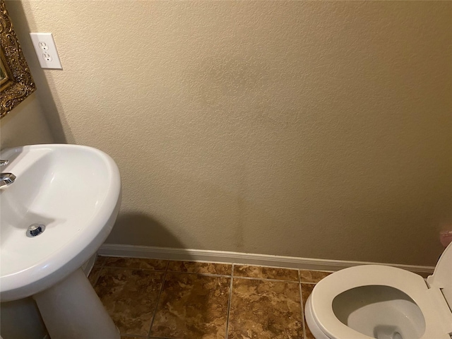 8615 Debbie Terrace Dr, Cypress, TX 77433 - half bath with baseboards and toilet