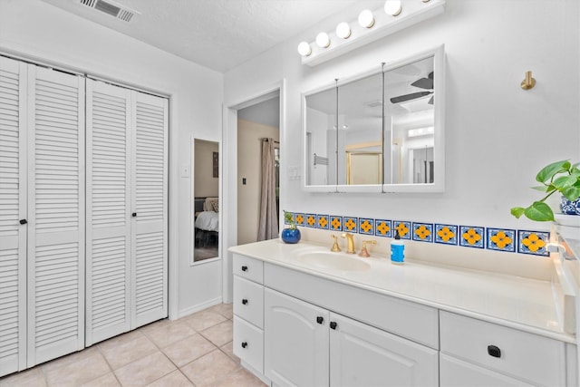4638 Deer Point Dr, Spring, TX 77389 - full bathroom featuring a closet, vanity, and tile patterned flooring